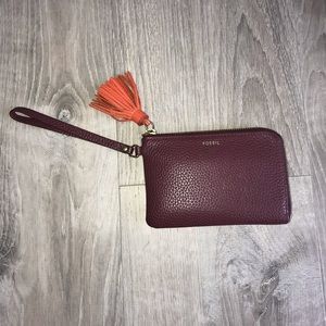 Burgundy Fossil Wristlet with orange accent